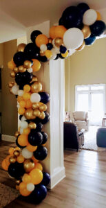 Organic garland, golden rod, navy blue, white, gold.
